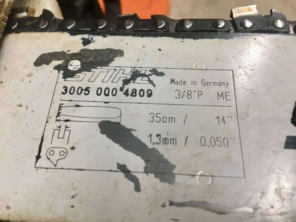 Chainsaw guide bar stamp